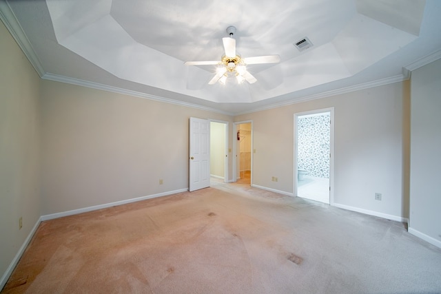 4854 Champions Way, Columbus, GA 31909 - unfurnished bedroom featuring a tray ceiling, light colored carpet, crown molding, a spacious closet, and ceiling fan