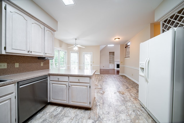 4854 Champions Way, Columbus, GA 31909 - kitchen featuring white fridge with ice dispenser, dishwasher, a peninsula, a ceiling fan, and light countertops