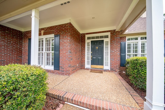 4854 Champions Way, Columbus, GA 31909 - view of exterior entry with brick siding and a porch