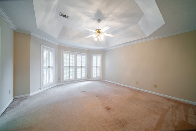 4854 Champions Way, Columbus, GA 31909 - empty room featuring a raised ceiling, light colored carpet, ceiling fan, and crown molding