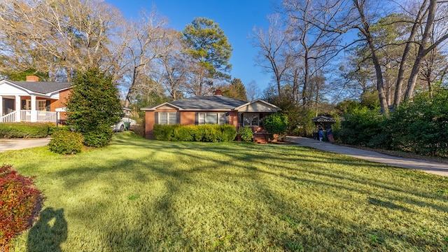 view of front of home with a front yard