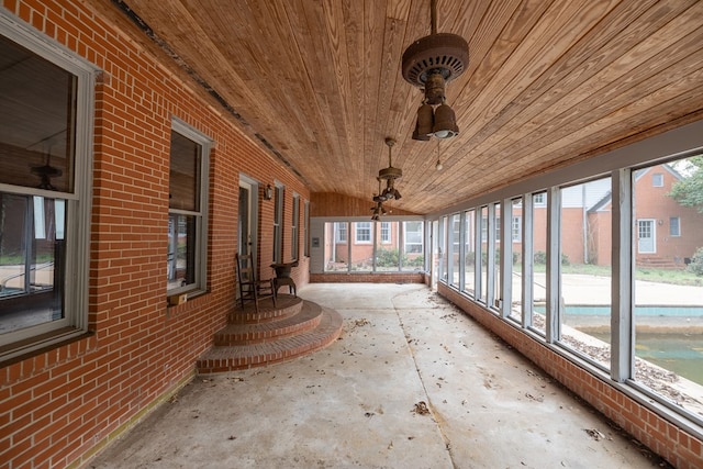 unfurnished sunroom featuring a healthy amount of sunlight