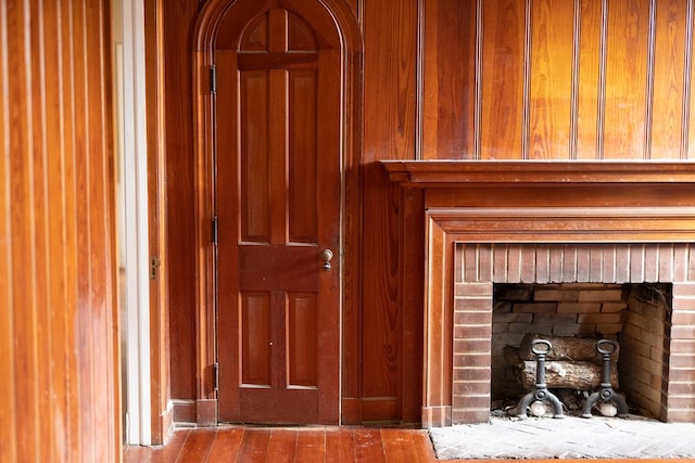 details featuring wood walls