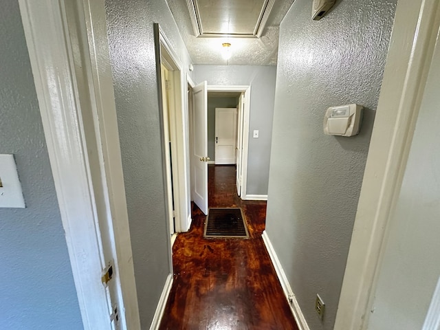 corridor with dark wood-type flooring