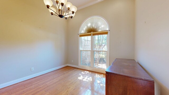 5007 Spyglass Ct, Columbus, GA 31909 - interior space featuring light wood-style flooring, crown molding, a chandelier, and baseboards
