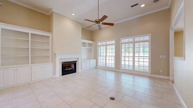 5007 Spyglass Ct, Columbus, GA 31909 - unfurnished living room featuring crown molding, ceiling fan, baseboards, and a fireplace