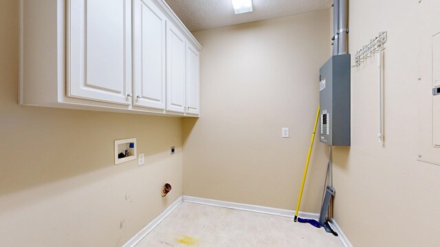 5007 Spyglass Ct, Columbus, GA 31909 - clothes washing area featuring hookup for an electric dryer, baseboards, hookup for a washing machine, and cabinet space