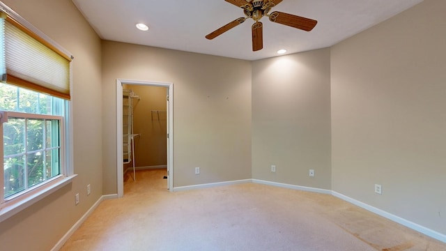 5007 Spyglass Ct, Columbus, GA 31909 - empty room featuring light carpet, recessed lighting, ceiling fan, and a healthy amount of sunlight