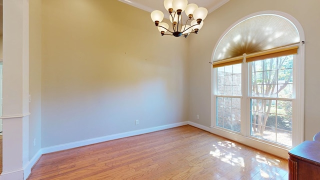 5007 Spyglass Ct, Columbus, GA 31909 - unfurnished room with an inviting chandelier, light wood-style flooring, baseboards, and ornamental molding