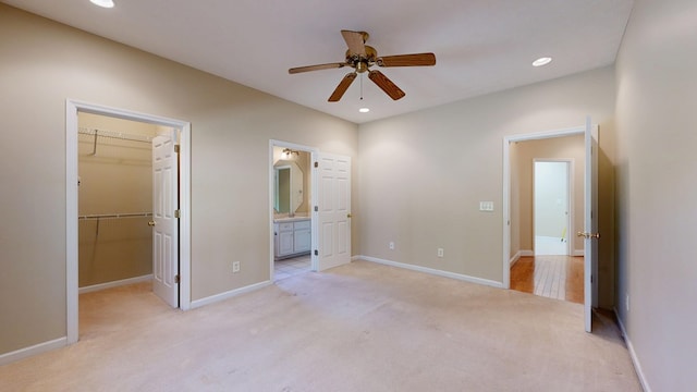 5007 Spyglass Ct, Columbus, GA 31909 - unfurnished bedroom featuring a spacious closet, recessed lighting, light colored carpet, and baseboards