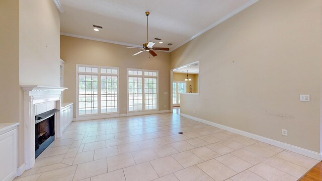 5007 Spyglass Ct, Columbus, GA 31909 - unfurnished living room featuring a wealth of natural light, a ceiling fan, and crown molding