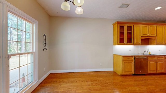 5007 Spyglass Ct, Columbus, GA 31909 - kitchen with a sink, light wood-style flooring, dishwasher, and baseboards