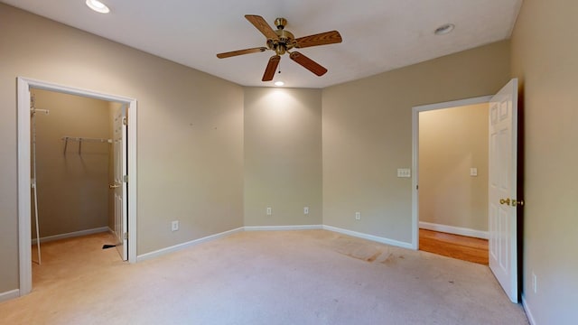 5007 Spyglass Ct, Columbus, GA 31909 - unfurnished bedroom with light colored carpet, baseboards, a walk in closet, and recessed lighting