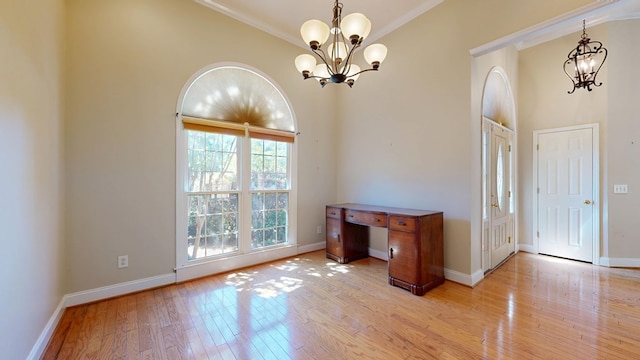 5007 Spyglass Ct, Columbus, GA 31909 - foyer with plenty of natural light, light wood finished floors, an inviting chandelier, and crown molding