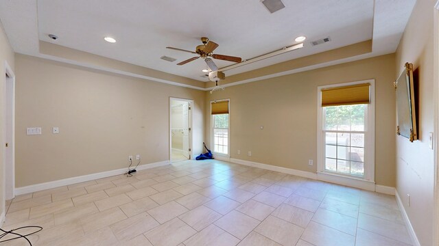 5007 Spyglass Ct, Columbus, GA 31909 - unfurnished room featuring a tray ceiling, ceiling fan, and visible vents