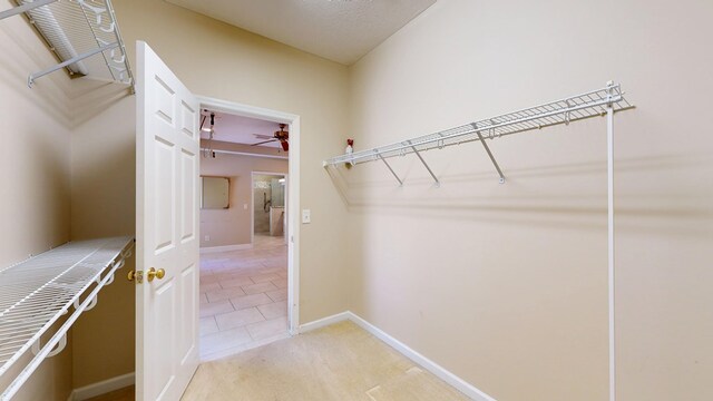 5007 Spyglass Ct, Columbus, GA 31909 - spacious closet with light carpet and ceiling fan