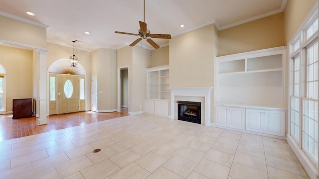 5007 Spyglass Ct, Columbus, GA 31909 - unfurnished living room featuring built in shelves, ceiling fan, a fireplace, crown molding, and recessed lighting