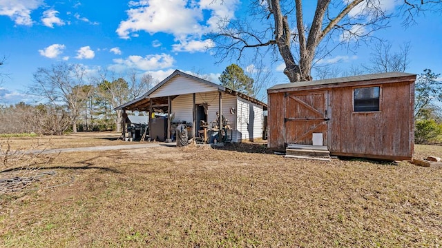 exterior space featuring a storage shed and a lawn