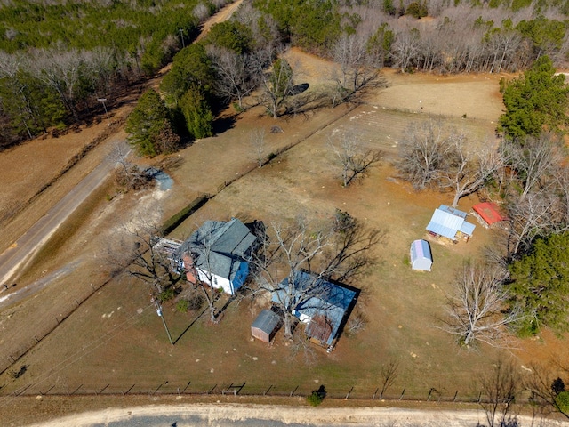 birds eye view of property featuring a rural view