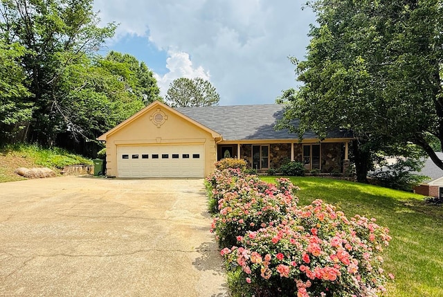 7642 Timberdale Dr, Columbus, GA 31909 - ranch-style home with an attached garage, a front lawn, and driveway