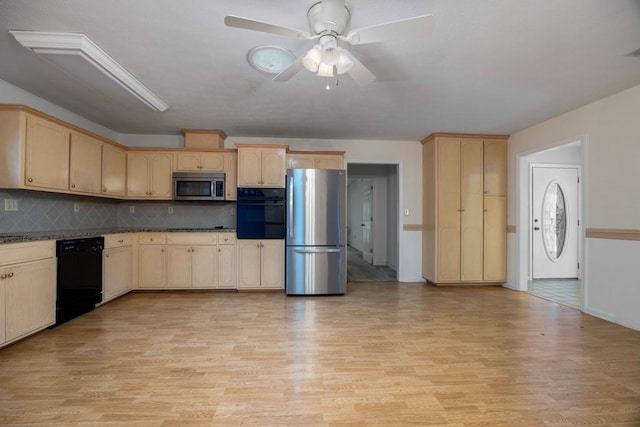 kitchen featuring backsplash, light wood-style flooring, black appliances, and light brown cabinetry