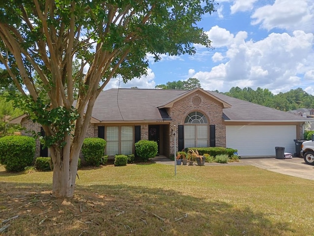 single story home featuring a garage and a front yard