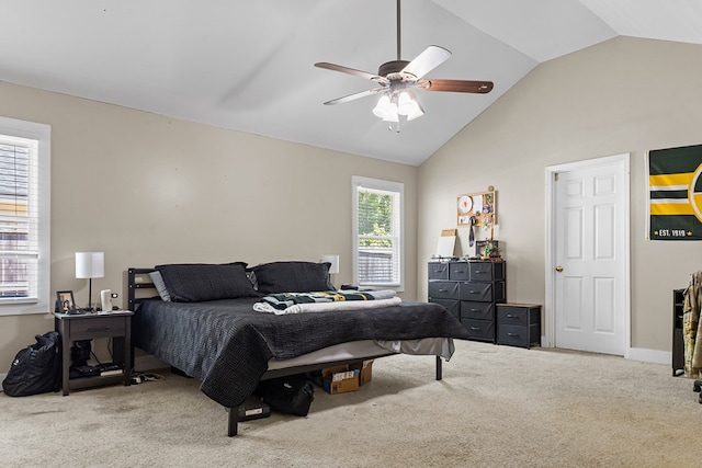 bedroom with carpet floors, a ceiling fan, and vaulted ceiling