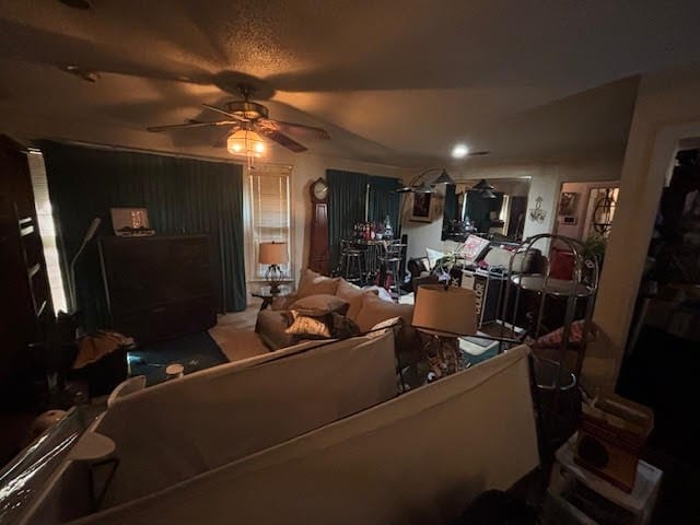 living room with a ceiling fan