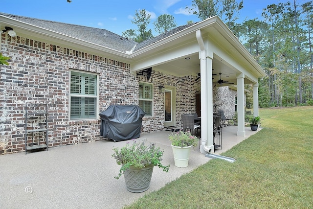 view of patio / terrace featuring ceiling fan and grilling area