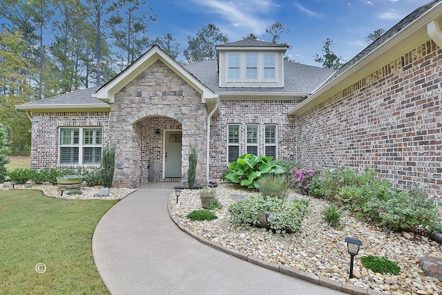 view of front of house with a front yard