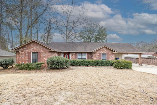 single story home with a carport