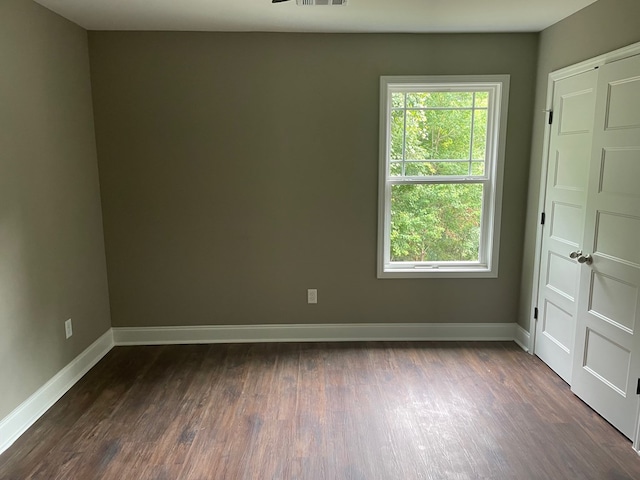 3077 Reese Rd, Columbus, GA 31907 - spare room featuring baseboards and dark wood-type flooring
