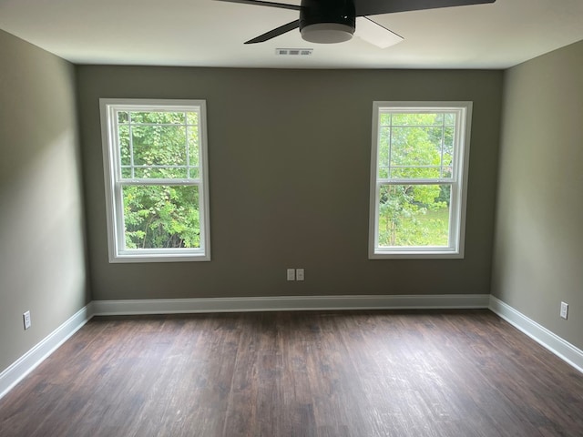 3077 Reese Rd, Columbus, GA 31907 - empty room with ceiling fan, healthy amount of natural light, and dark wood-type flooring