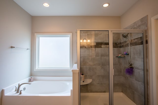 6845 Admiral Dr, Midland, GA 31820 - bathroom with a bath, a shower stall, and recessed lighting