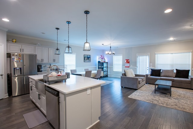 6845 Admiral Dr, Midland, GA 31820 - kitchen featuring stainless steel appliances, dark wood-type flooring, white cabinetry, and light countertops
