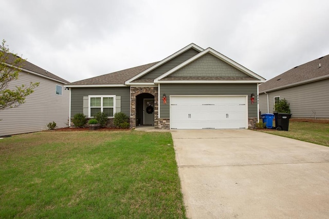 6845 Admiral Dr, Midland, GA 31820 - craftsman-style home featuring concrete driveway, a garage, stone siding, and a front yard