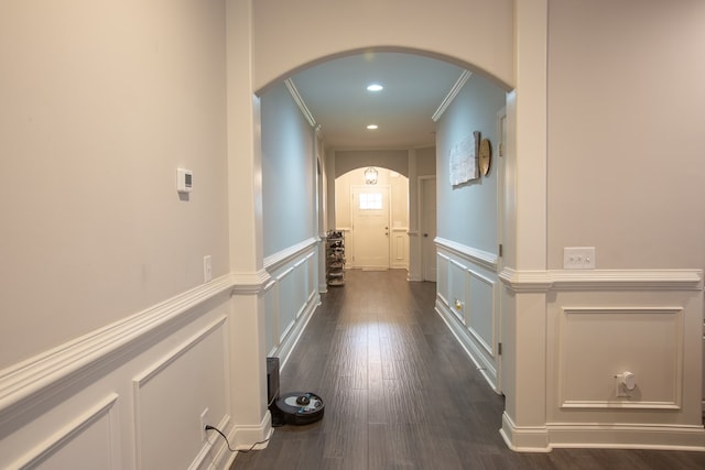 6845 Admiral Dr, Midland, GA 31820 - hallway featuring a decorative wall, arched walkways, crown molding, and dark wood-style flooring
