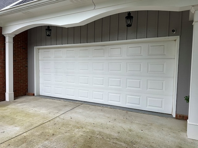 garage featuring driveway