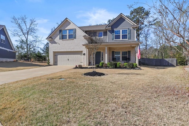 view of front of home with driveway, fence, a front yard, an attached garage, and brick siding