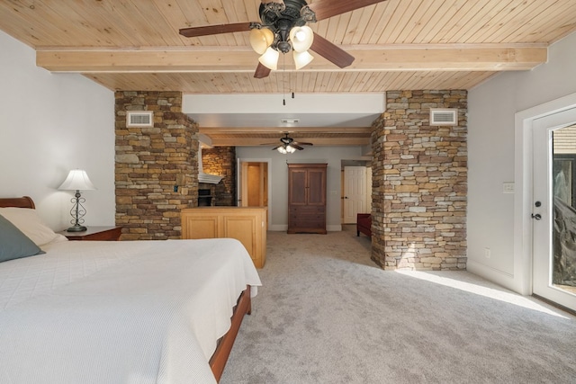 bedroom featuring beam ceiling, light colored carpet, and wood ceiling