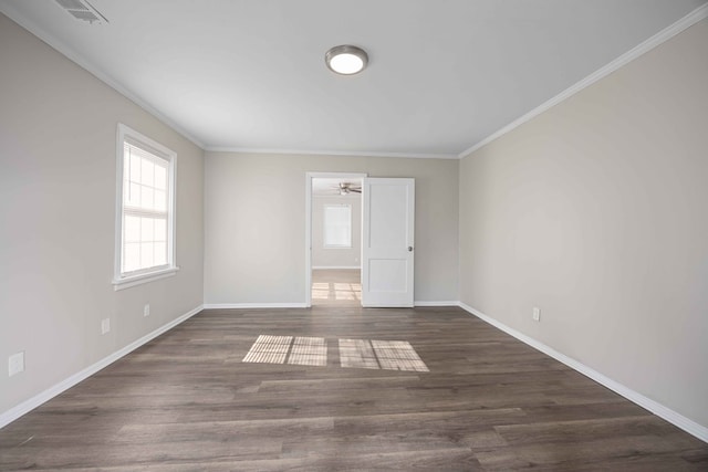 unfurnished room with ceiling fan, dark wood-type flooring, and ornamental molding