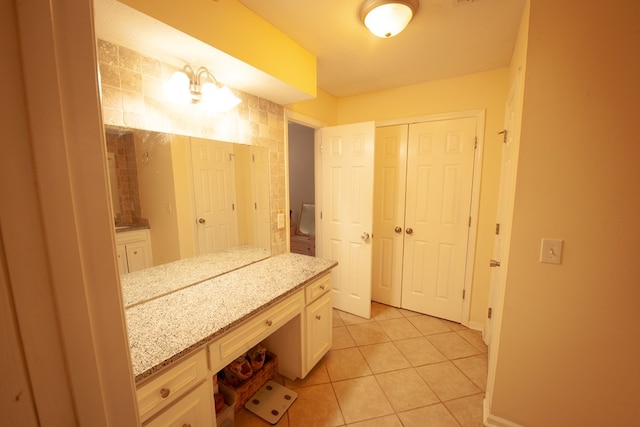 full bath with tile patterned flooring