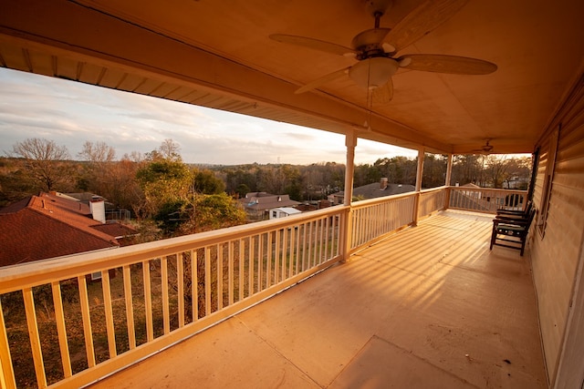 exterior space featuring ceiling fan