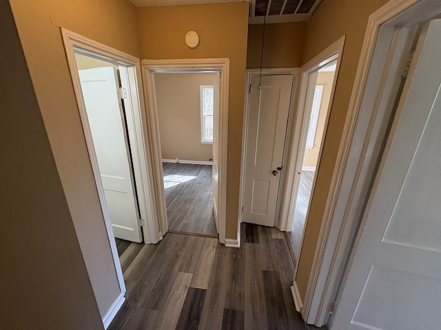 hall featuring dark hardwood / wood-style flooring