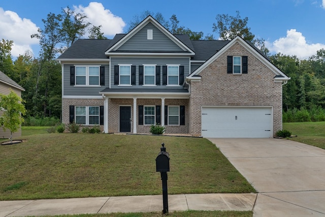 craftsman-style home featuring a front lawn and a garage