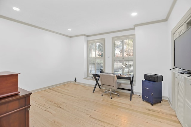 home office featuring light wood-type flooring and crown molding