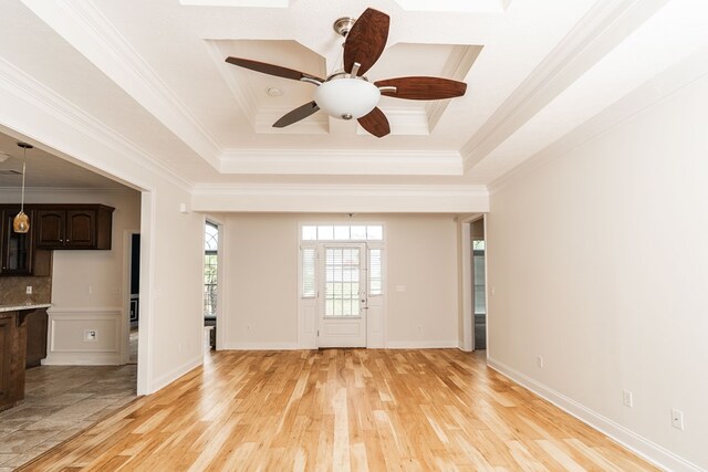 144 Lee Road 2083, Phenix City, AL 36870 - empty room with crown molding, light wood-style floors, ceiling fan, and a raised ceiling