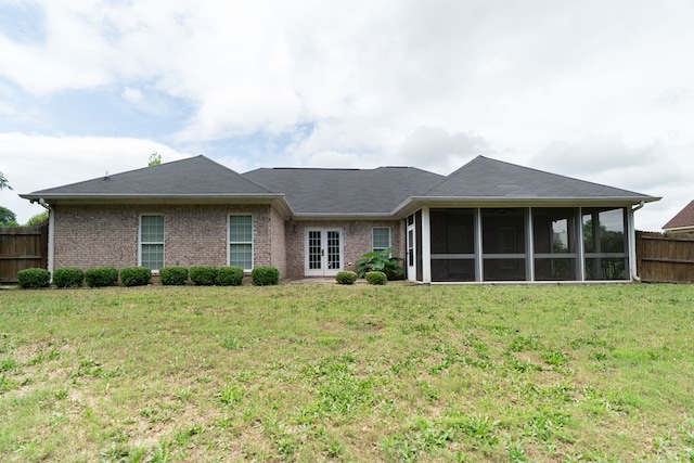 144 Lee Road 2083, Phenix City, AL 36870 - back of property with a sunroom and brick siding
