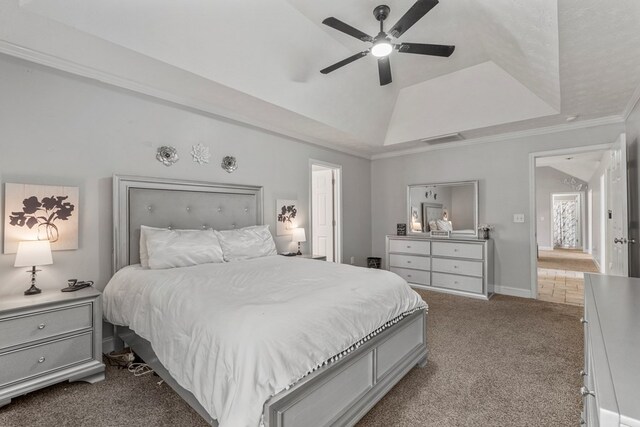 176 Lee Road 0504, Phenix City, AL 36870 - bedroom featuring a tray ceiling, dark carpet, crown molding, and a ceiling fan