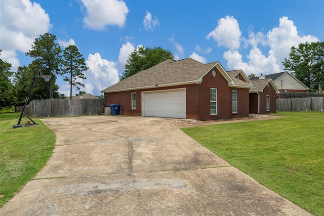176 Lee Road 0504, Phenix City, AL 36870 - view of front of property with driveway, brick siding, a garage, and roof with shingles